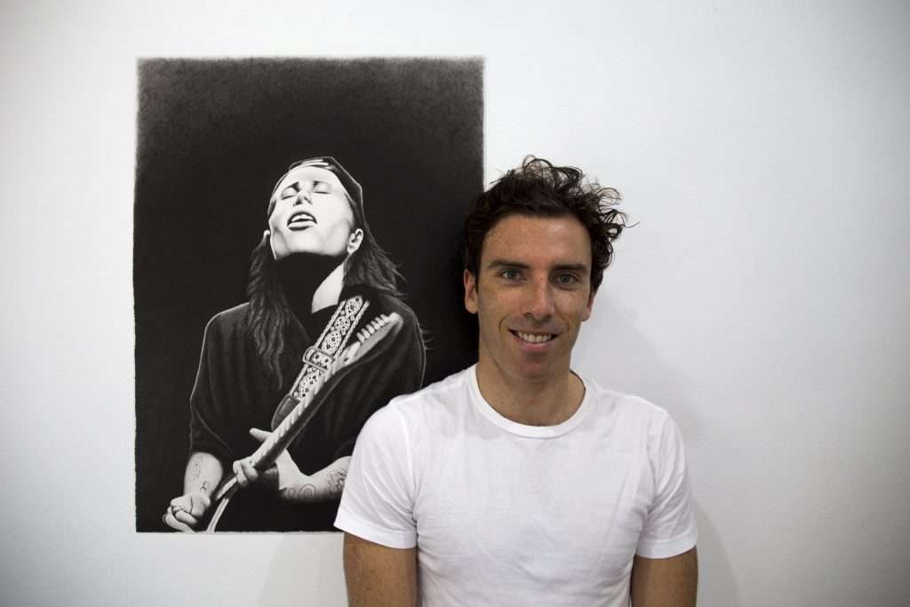 Artist Dean Spinks with Tash Sultana portrait