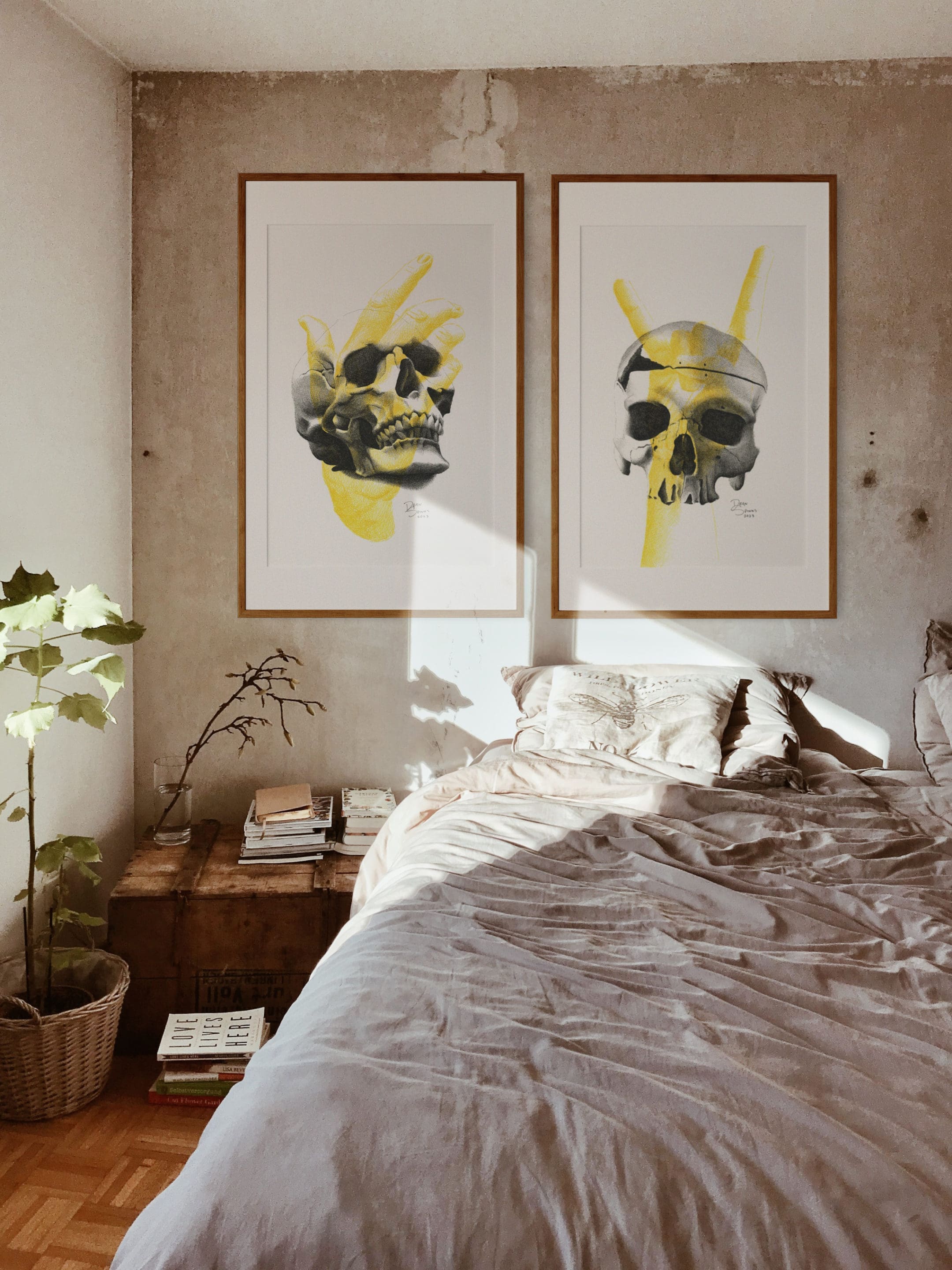 skulls and hands drawing on a wall
