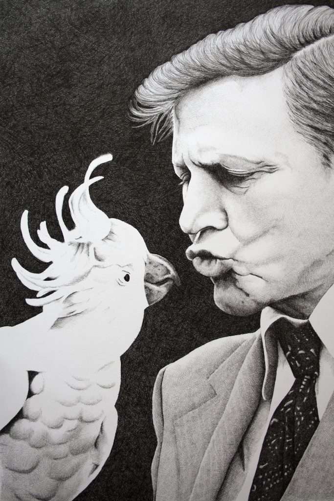 Portrait of David Attenborough kissing a cockatoo