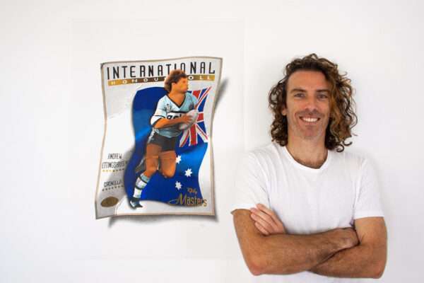 Artist Dean Spinks with Andrew Ettingshausen Footy Card artwork