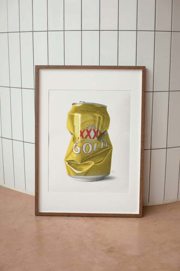 XXXX beer can artwork in frame leaning against wall