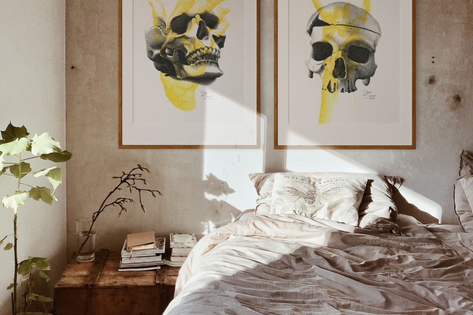 skulls and hands drawing on a wall